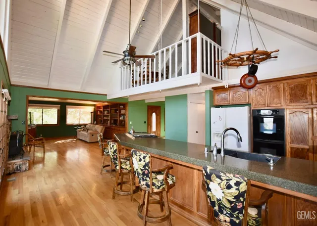 a view of a living room and dining room