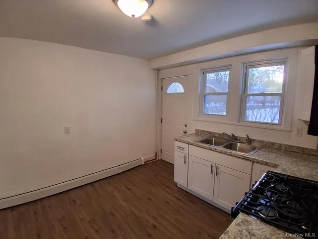 a bathroom with a toilet and a sink