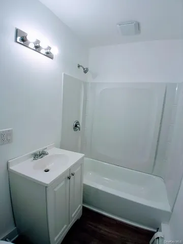 a bathroom with a toilet and a sink
