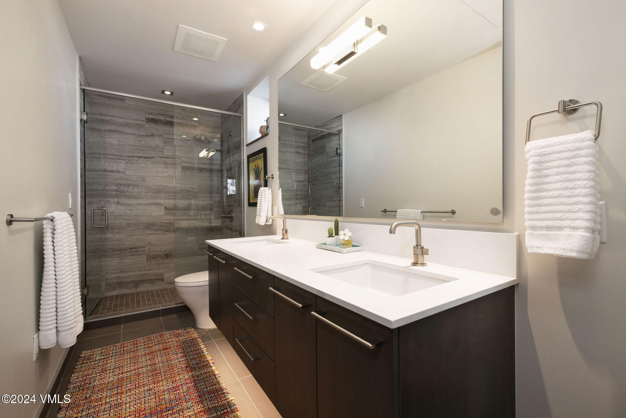 430 South Frontage Road East, Unit RU301 Vail, CO 81657 - Photo 15 of 29 a bathroom with a sink and a mirror