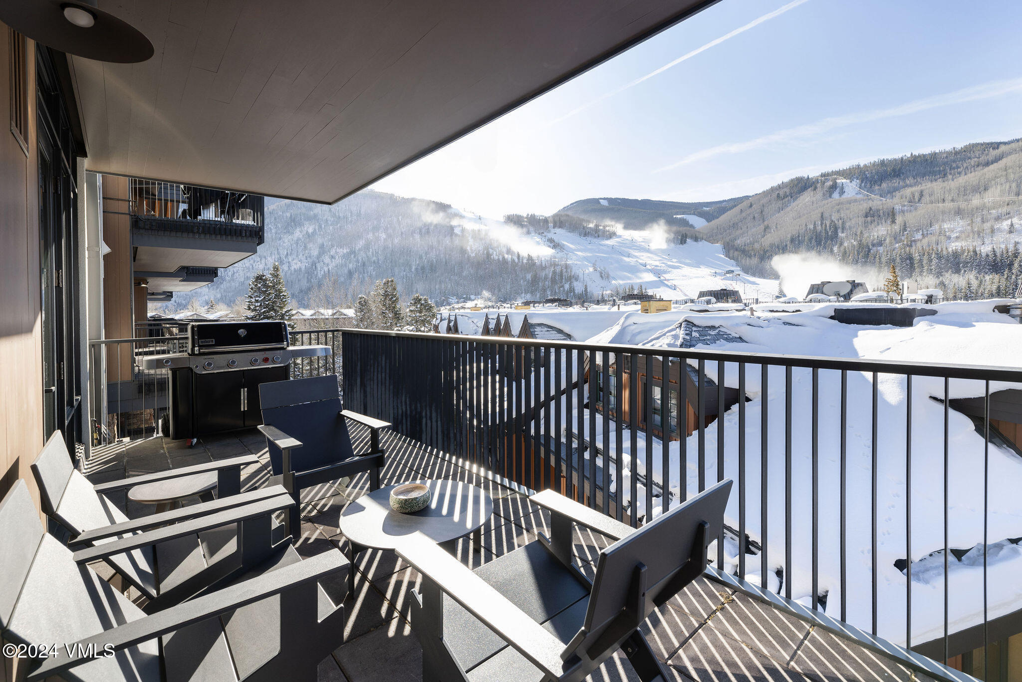 430 South Frontage Road East, Unit RU301 Vail, CO 81657 - Photo 5 of 29 a view of a balcony with chairs