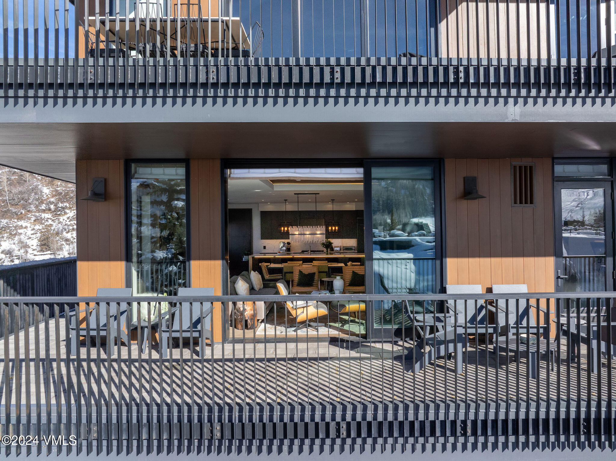 430 South Frontage Road East, Unit RU301 Vail, CO 81657 - Photo 8 of 29 a view of a patio with dining table and chairs