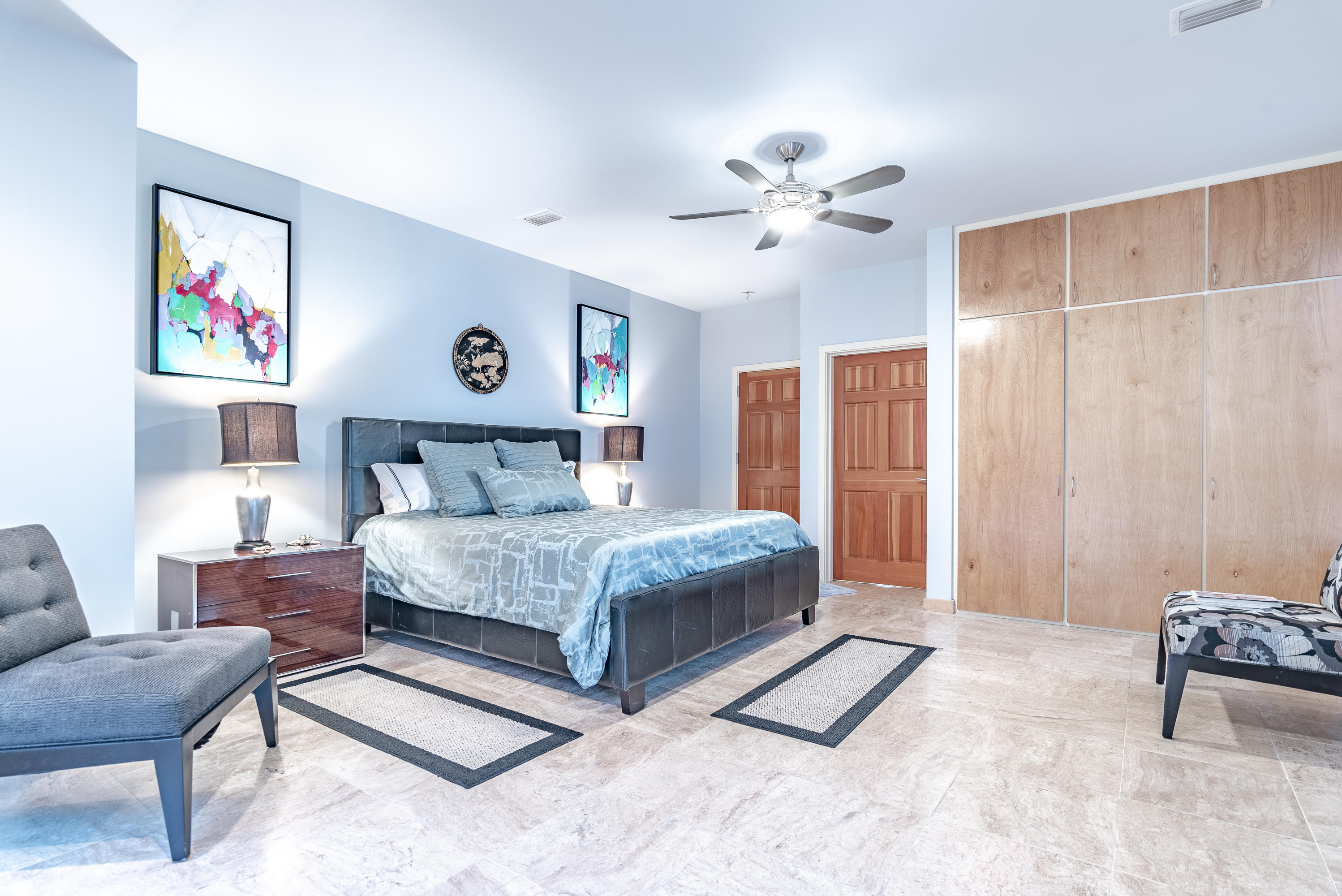 52 Camp Creek Point Inlet Beach, FL 32461 - Photo 25 of 74 a bedroom with a bed a couch and a chandelier