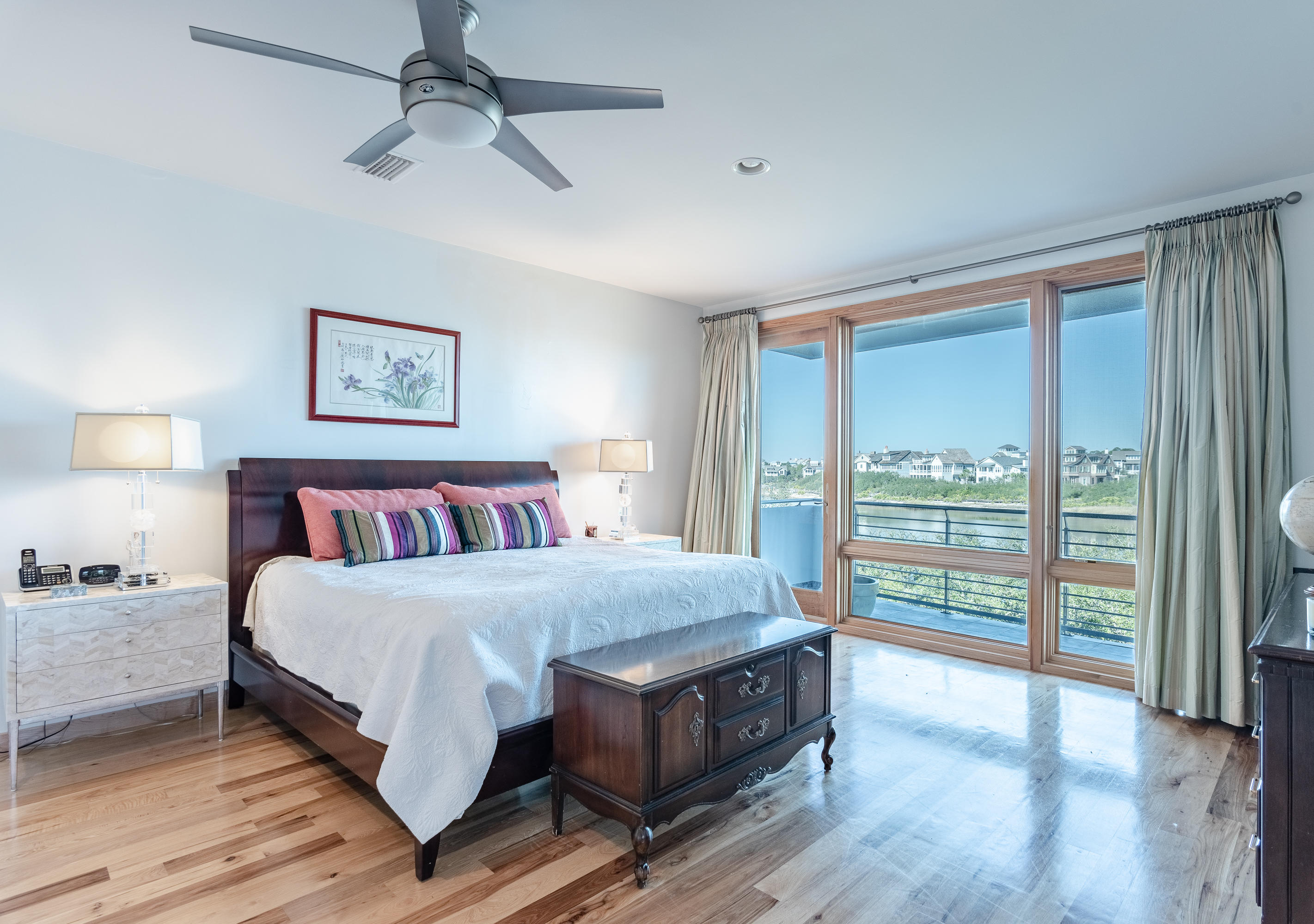 52 Camp Creek Point Inlet Beach, FL 32461 - Photo 36 of 74 a bedroom with a large bed and a large window
