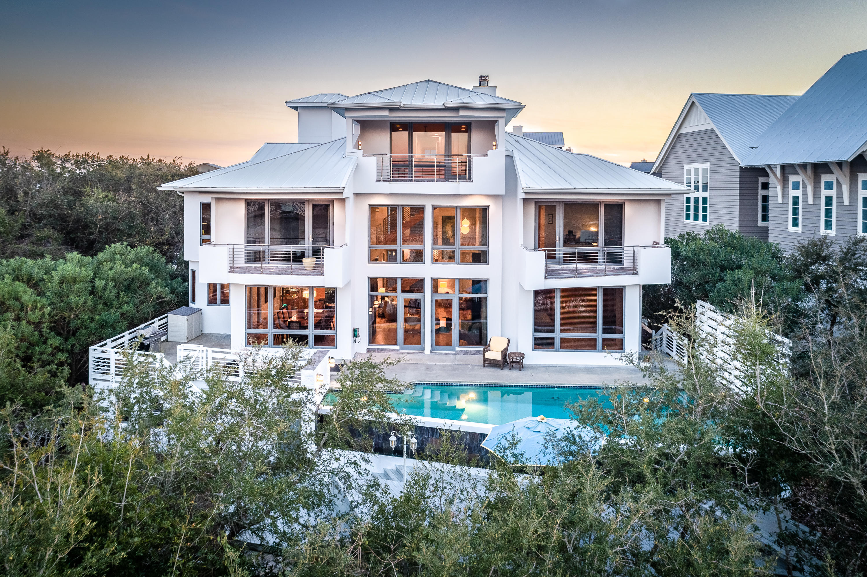 52 Camp Creek Point Inlet Beach, FL 32461 - Photo 61 of 74 a front view of a house with balcony and garden