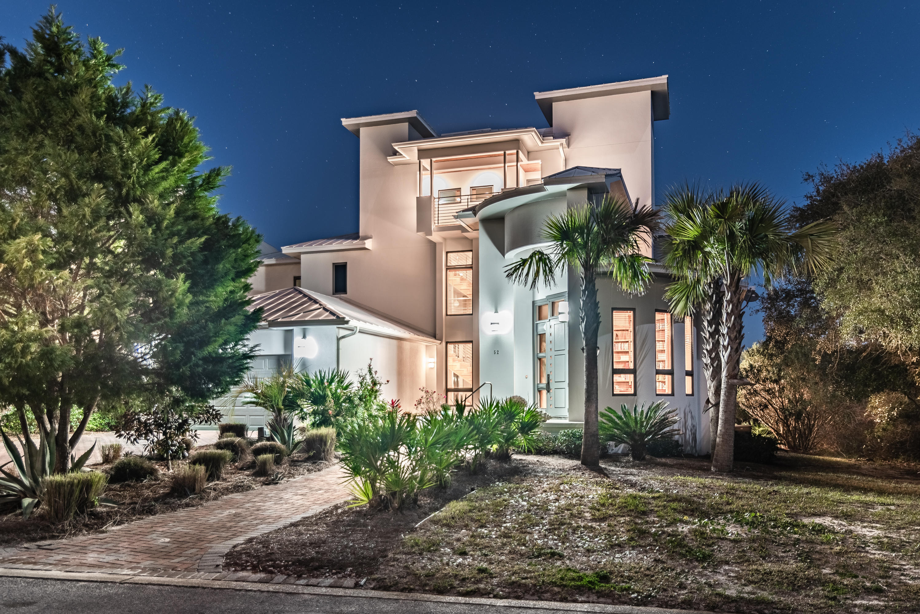 52 Camp Creek Point Inlet Beach, FL 32461 - Photo 64 of 74 a front view of a house with garden