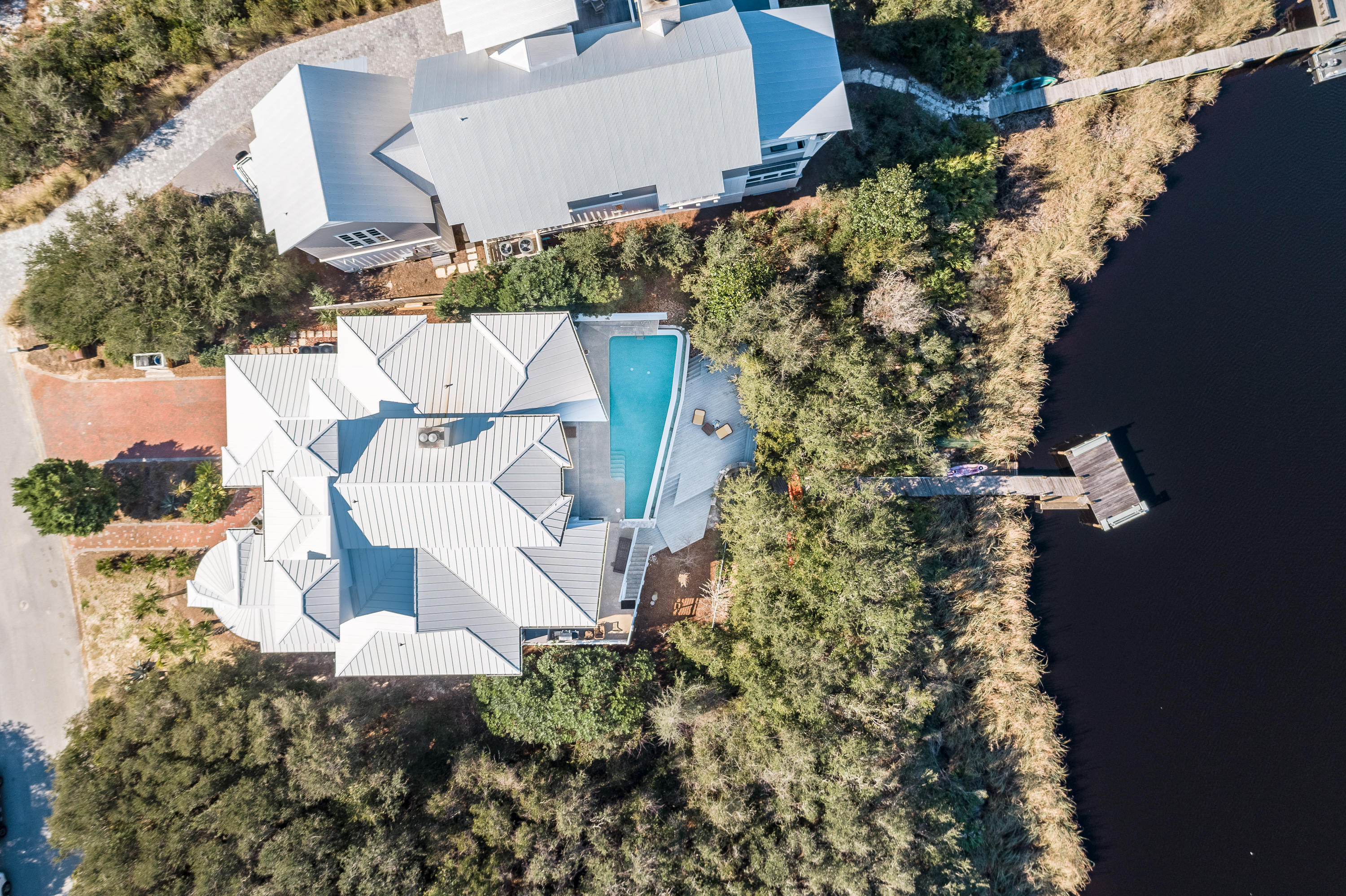 52 Camp Creek Point Inlet Beach, FL 32461 - Photo 70 of 74 an aerial view of a house with a yard and garden