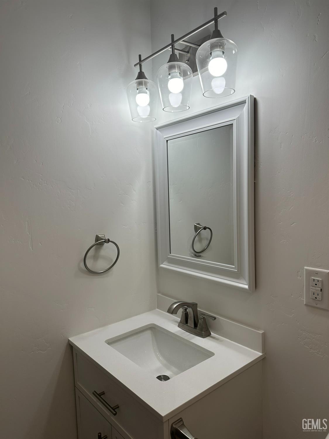Undisclosed Address Shafter, CA 93263 - Photo 17 of 21 a bathroom with a sink and a mirror