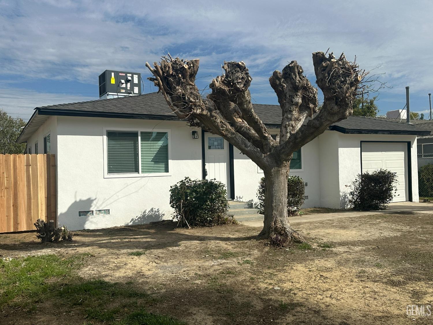 Undisclosed Address Shafter, CA 93263 - Photo 20 of 21 a front view of a house with garden