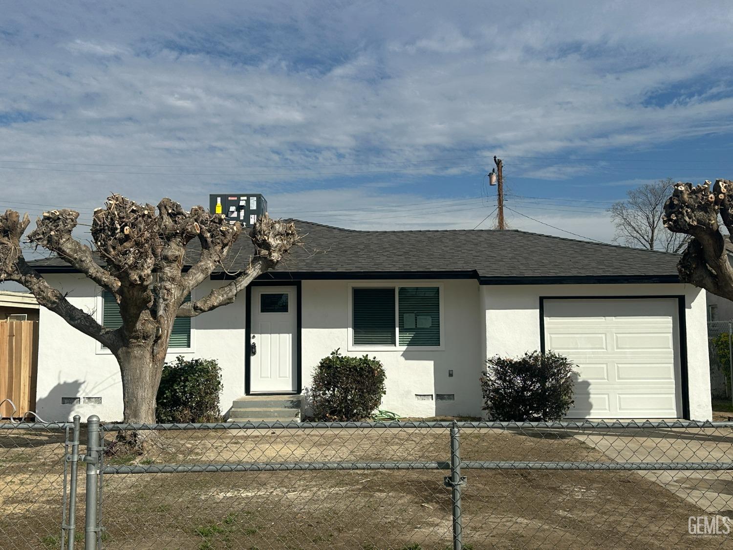 Undisclosed Address Shafter, CA 93263 - Photo 21 of 21 a front view of a house with a porch