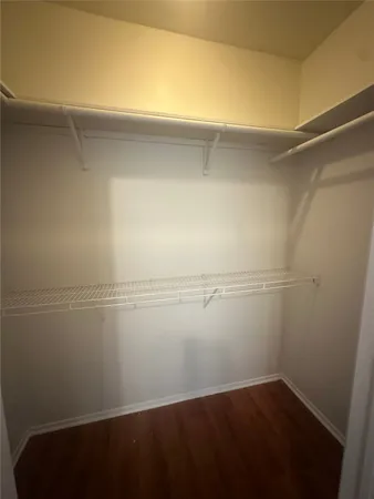 a view of small space with racks on the wall