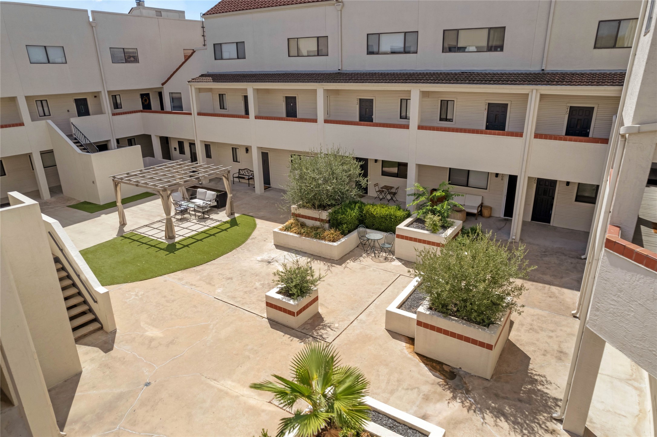 2605 Enfield Road, Unit 221 Austin, TX 78703 - Photo 13 of 30 All units open to the recently updated courtyard.