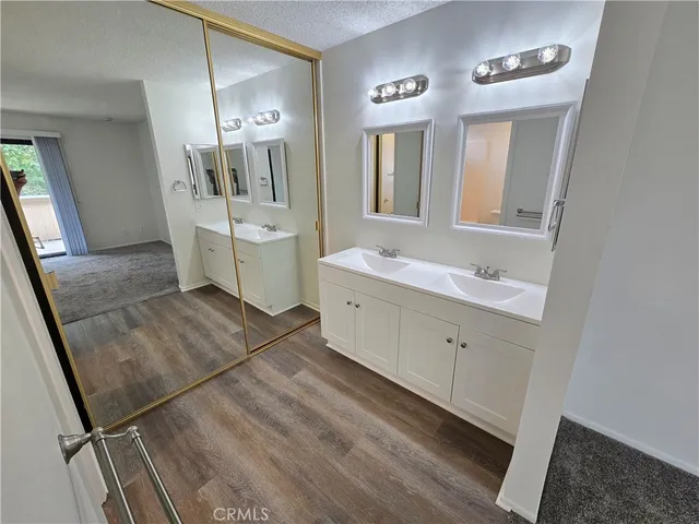 a bathroom with a bathtub and toilet