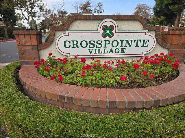 a front view of a house with parking area