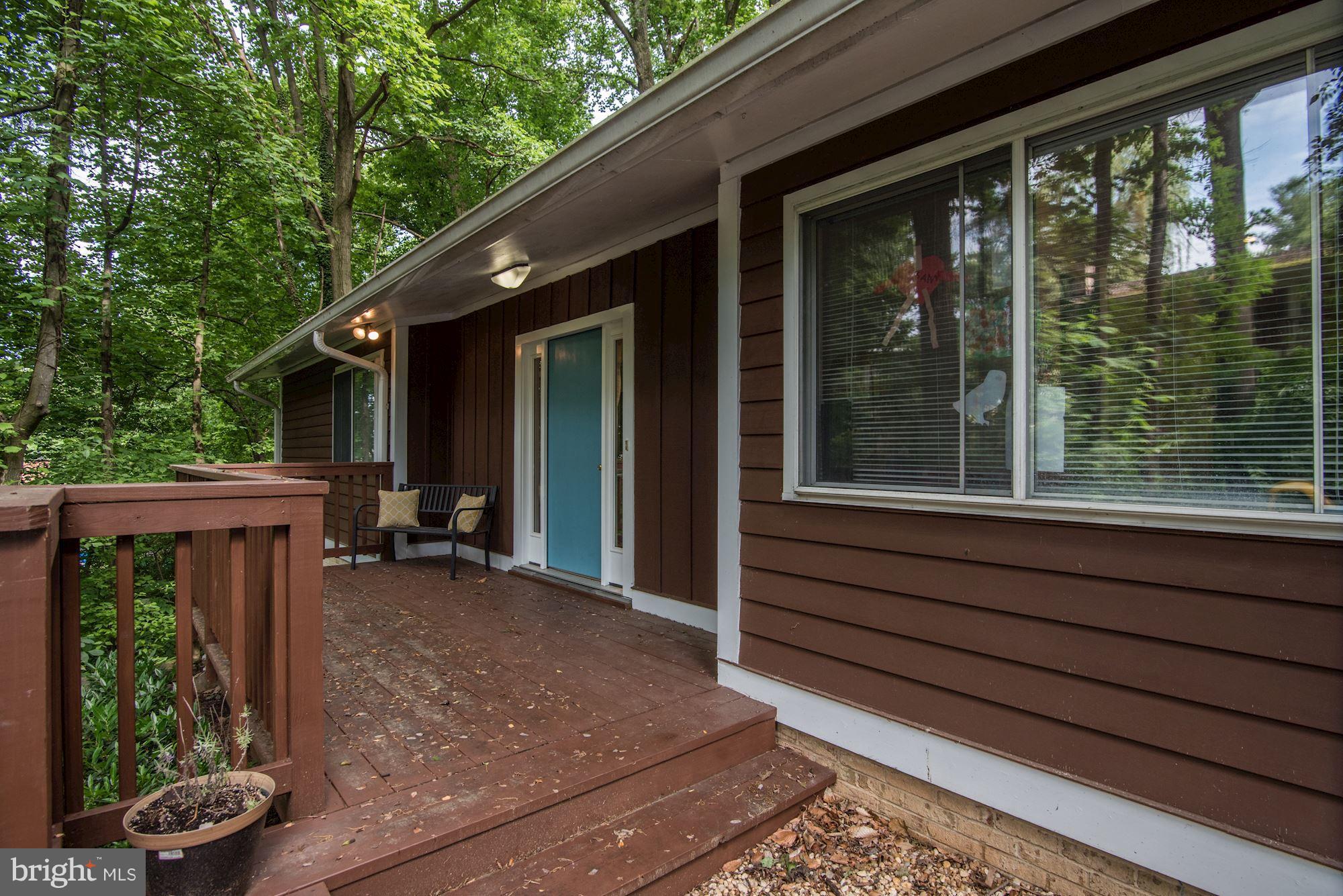 7608 Hamilton Spring Road Bethesda, MD 20817 - Photo 2 of 21 a view of a house with backyard and porch