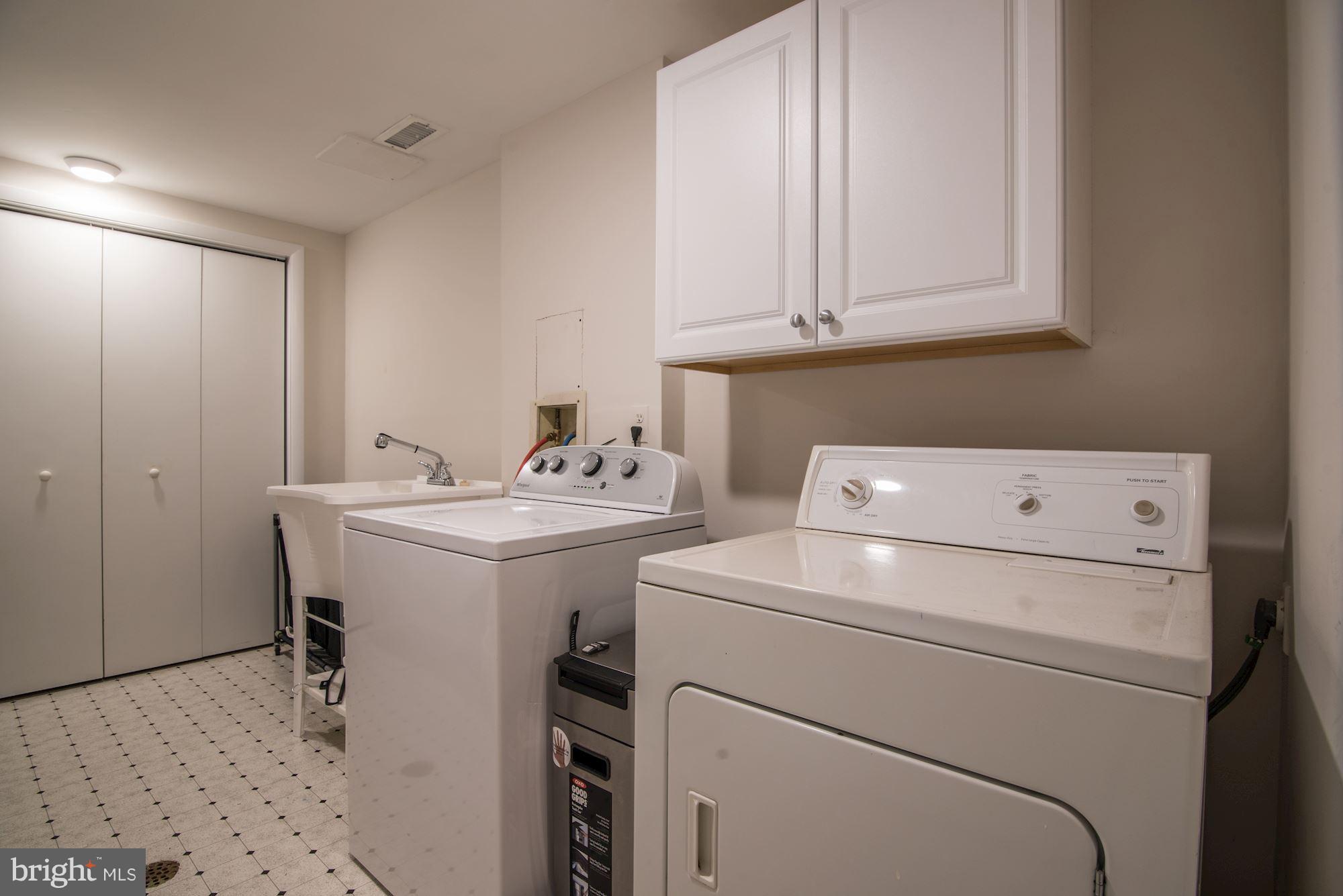 7608 Hamilton Spring Road Bethesda, MD 20817 - Photo 19 of 21 a utility room with dryer and washer