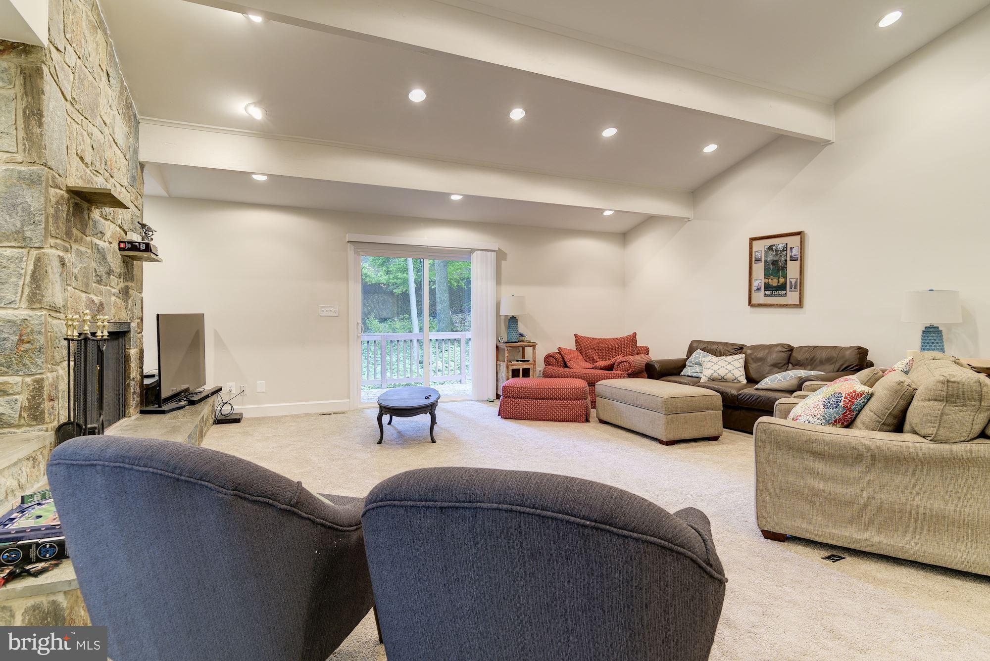 7608 Hamilton Spring Road Bethesda, MD 20817 - Photo 9 of 21 a living room with furniture and a couch