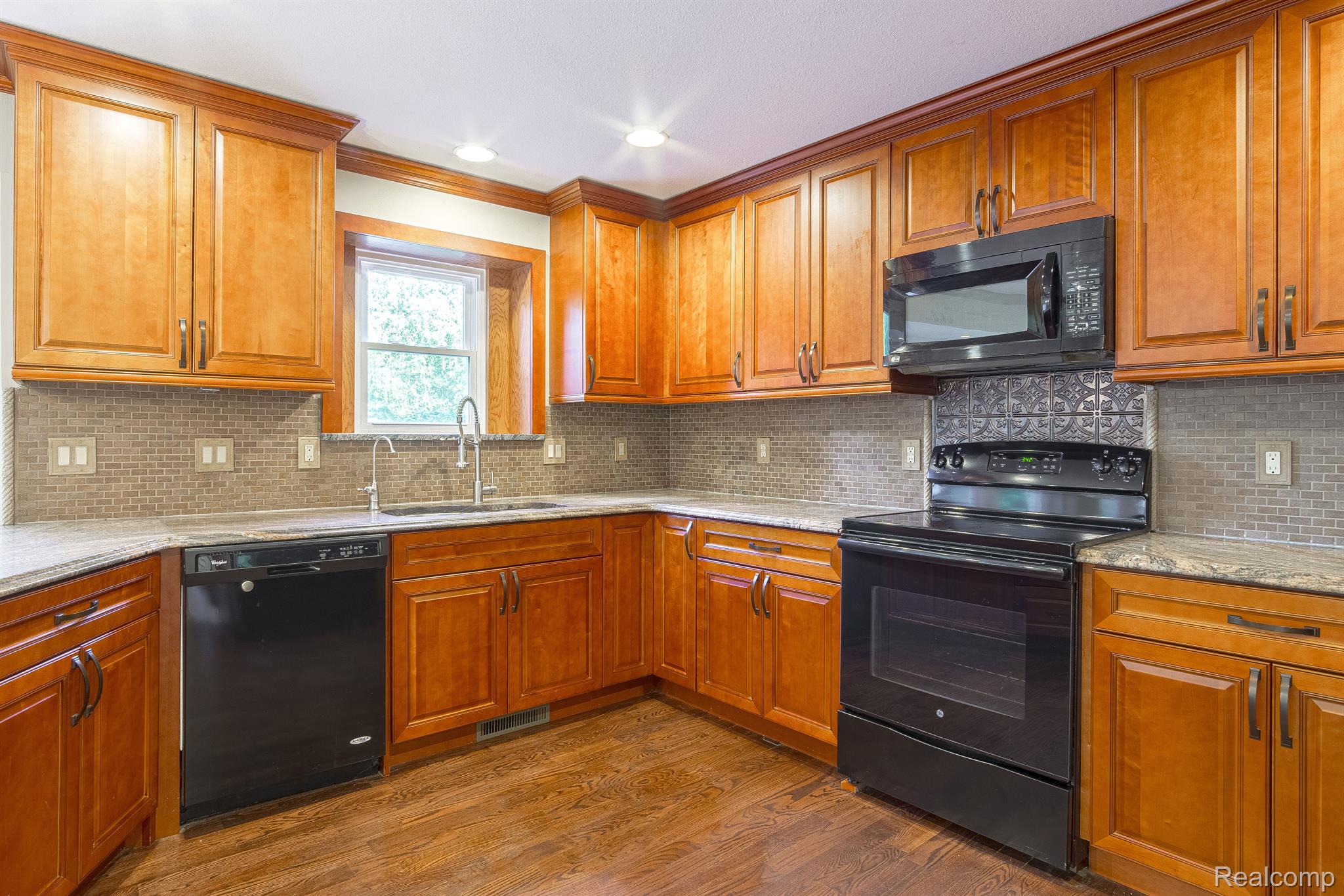 3930 Cullen Road Howell, MI 48855 - Photo 30 of 61 Large Kitchen with beautiful Granite Counters