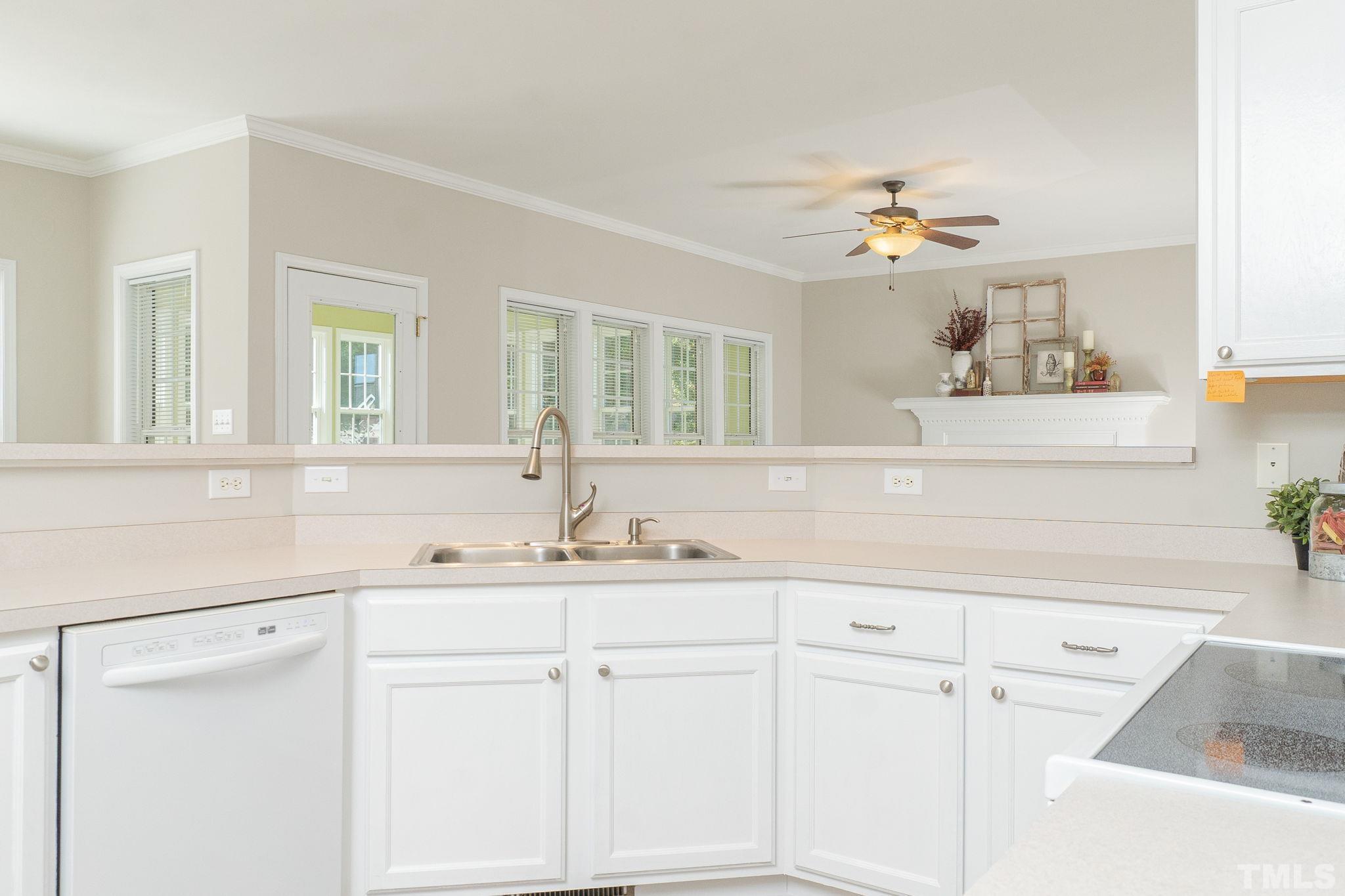 4812 Elmhurst Ridge Court Raleigh, NC 27616 - Photo 11 of 23 a bathroom with a sink and a mirror