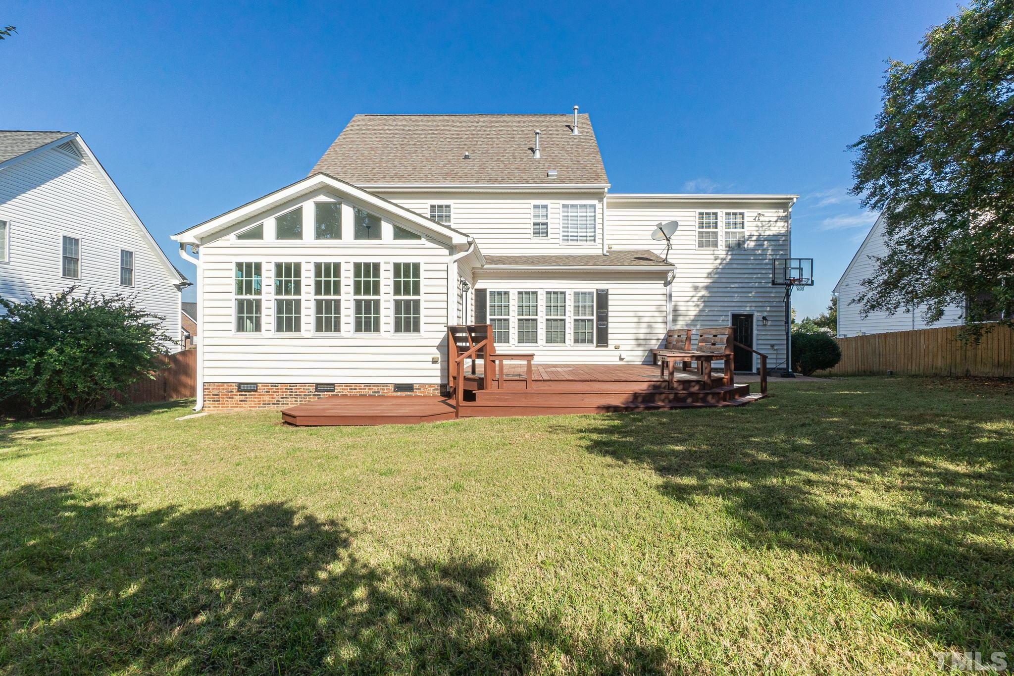 4812 Elmhurst Ridge Court Raleigh, NC 27616 - Photo 18 of 23 a view of a house with a swimming pool