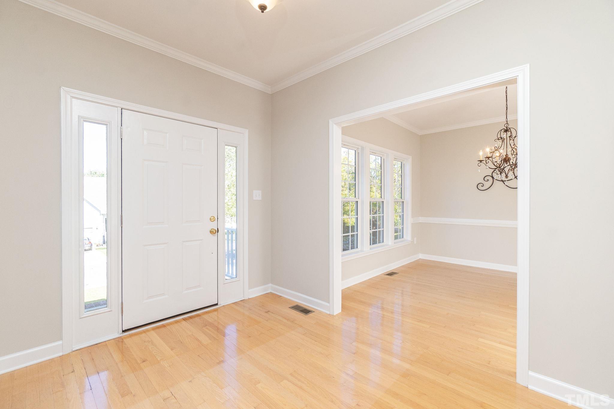 4812 Elmhurst Ridge Court Raleigh, NC 27616 - Photo 3 of 23 a view of an empty room with a window