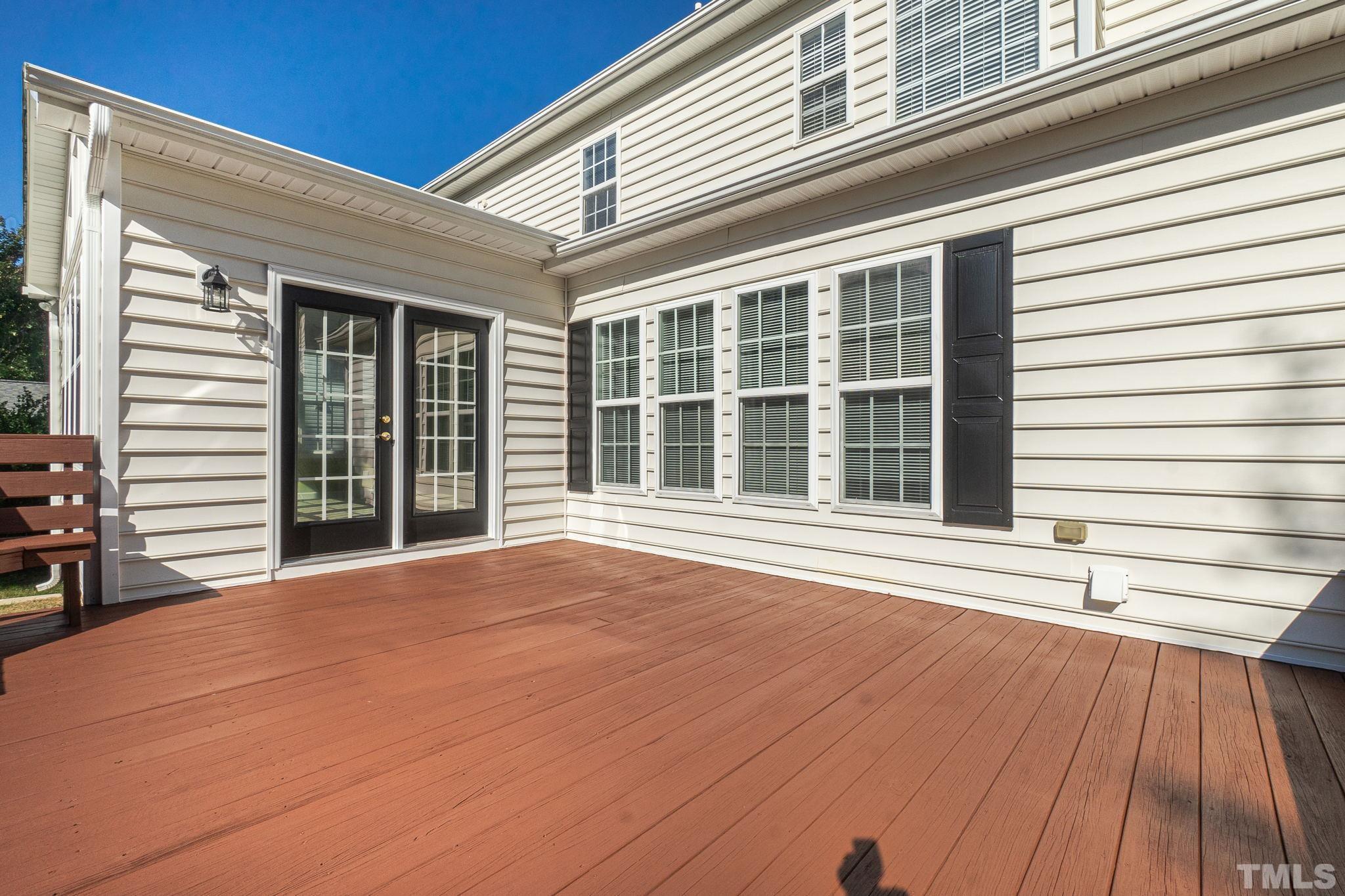 4812 Elmhurst Ridge Court Raleigh, NC 27616 - Photo 21 of 23 a view of a house with a roof deck