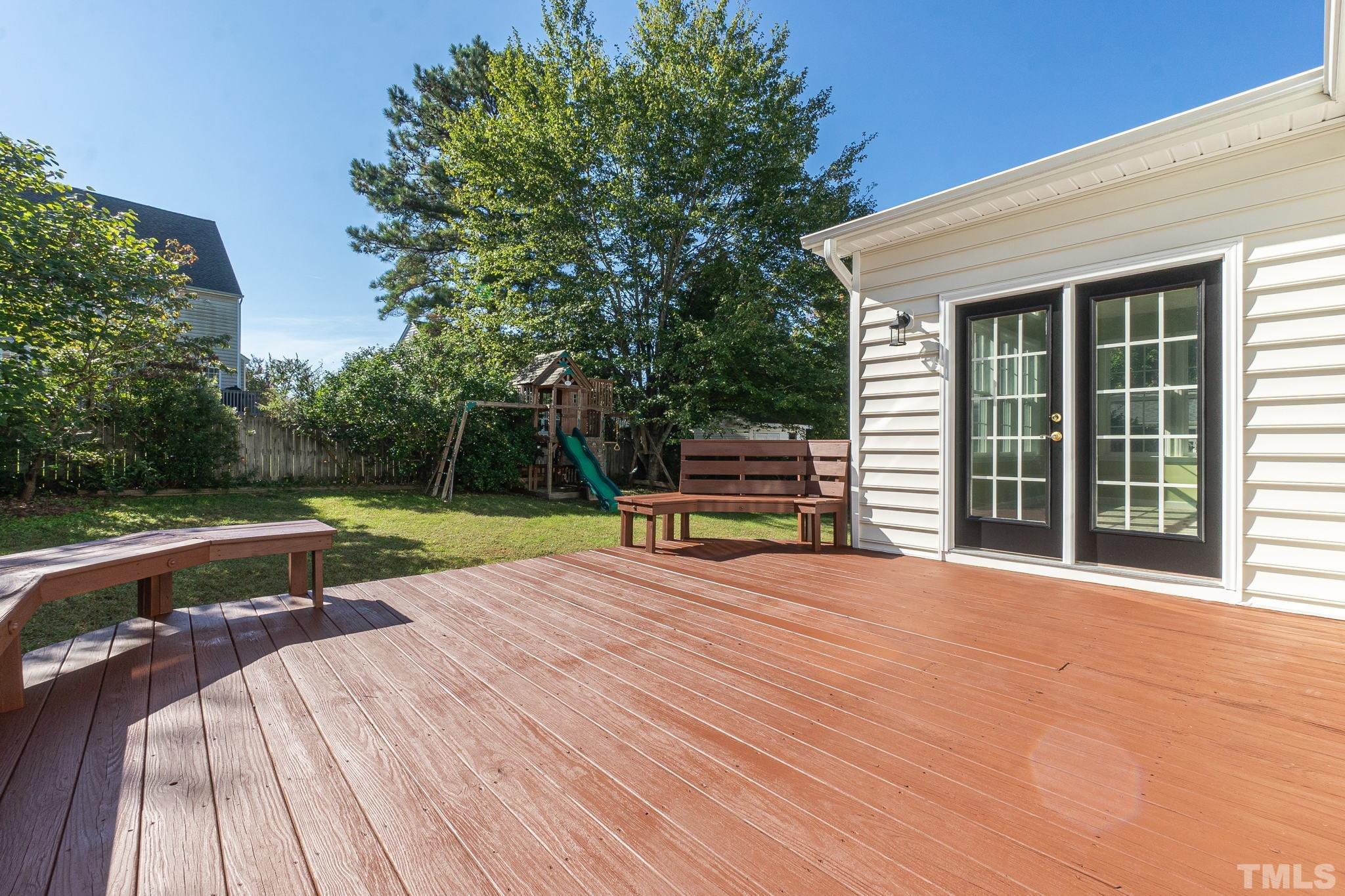 4812 Elmhurst Ridge Court Raleigh, NC 27616 - Photo 22 of 23 a view of backyard with swimming pool and outdoor seating