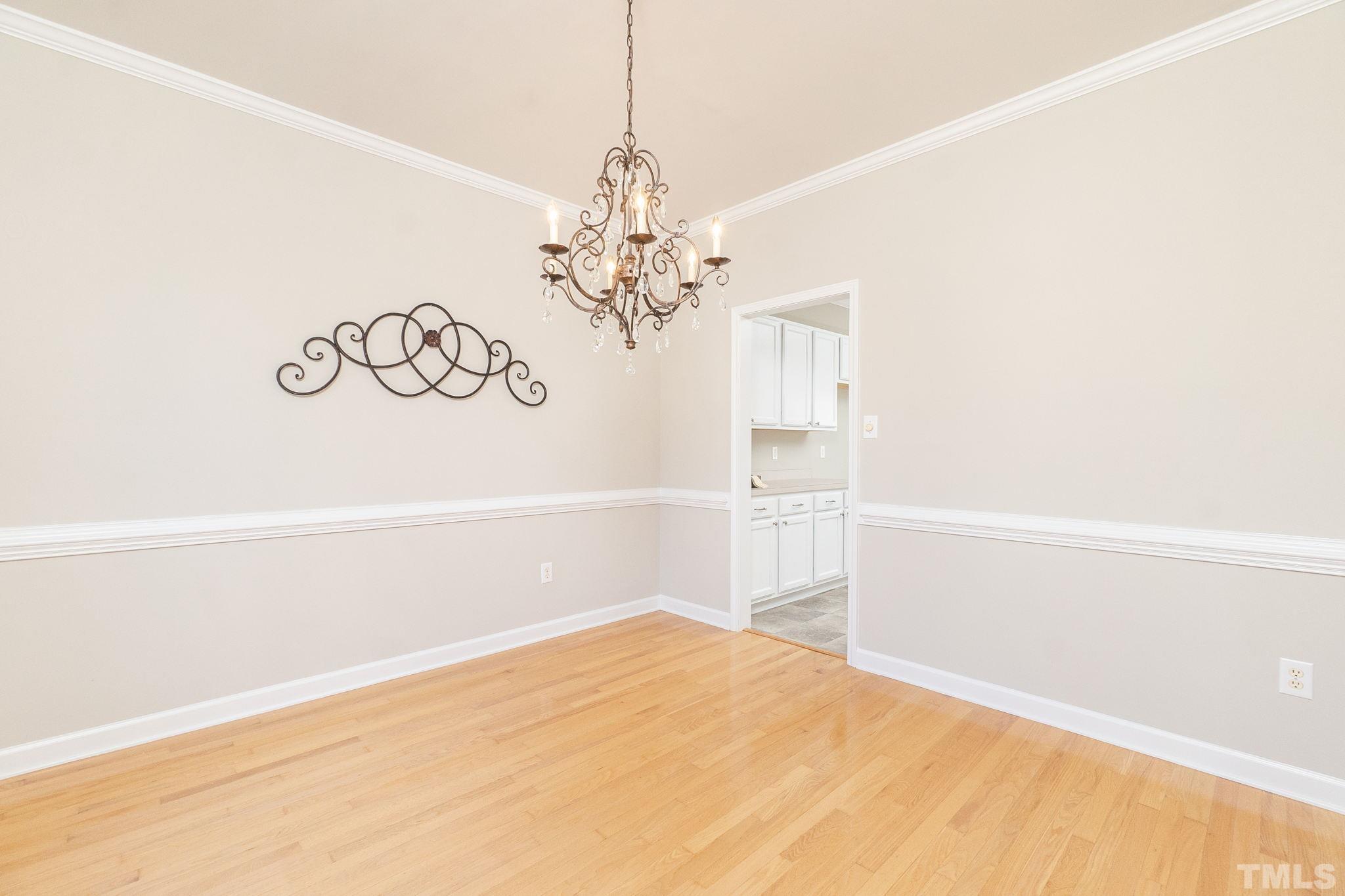 4812 Elmhurst Ridge Court Raleigh, NC 27616 - Photo 4 of 23 a view of a room with a window