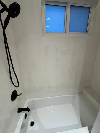 a bathroom with a bathtub