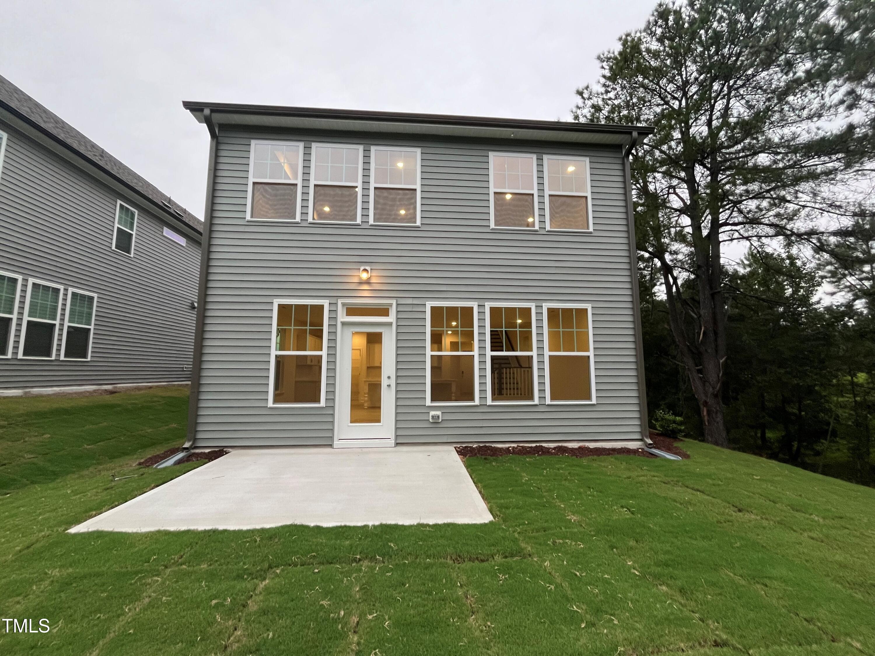 5208 Ranger Grv Way Raleigh, NC 27604 - Photo 4 of 59 a front view of a house with garden