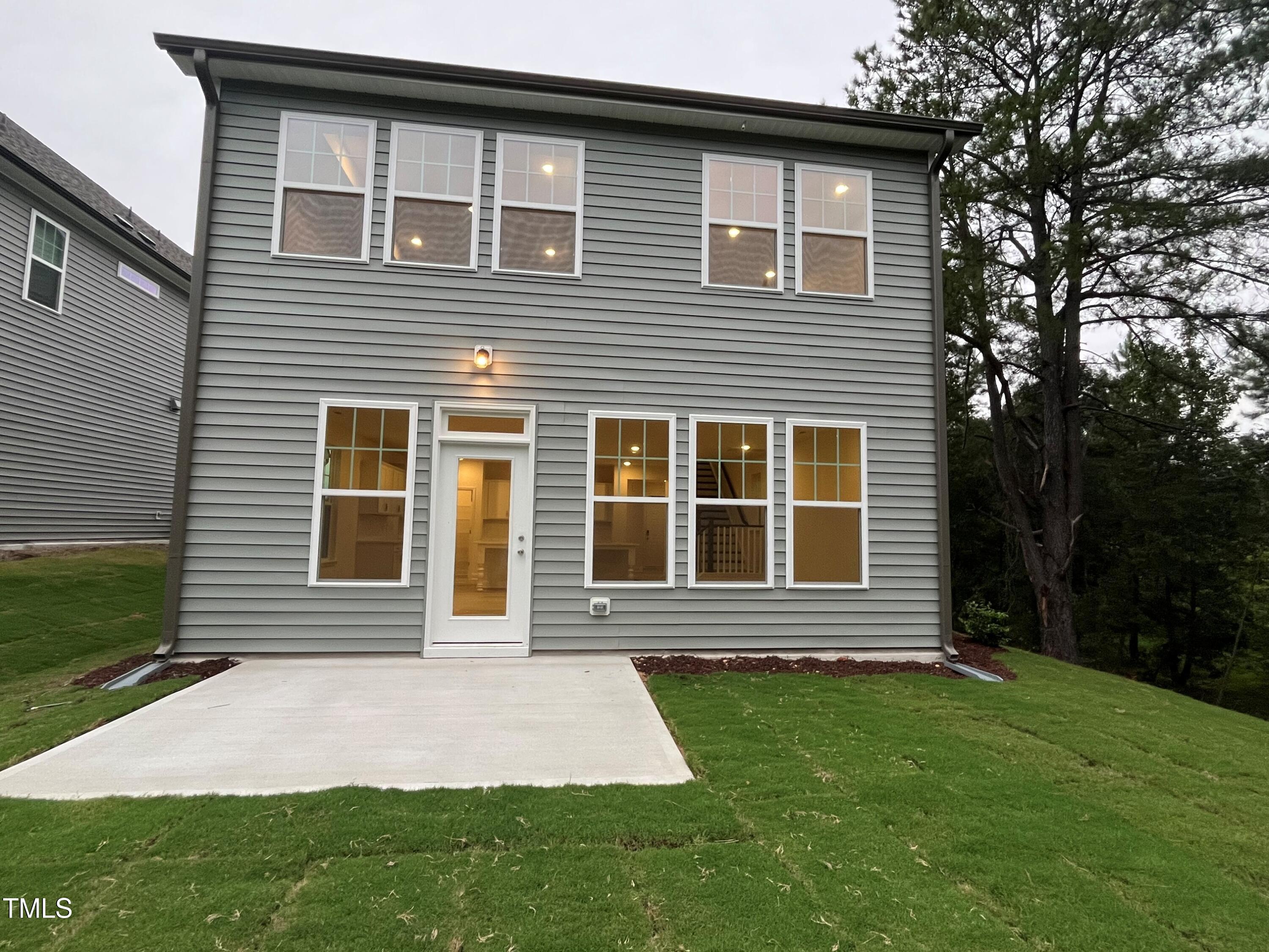 5208 Ranger Grv Way Raleigh, NC 27604 - Photo 5 of 59 a front view of a house with garden