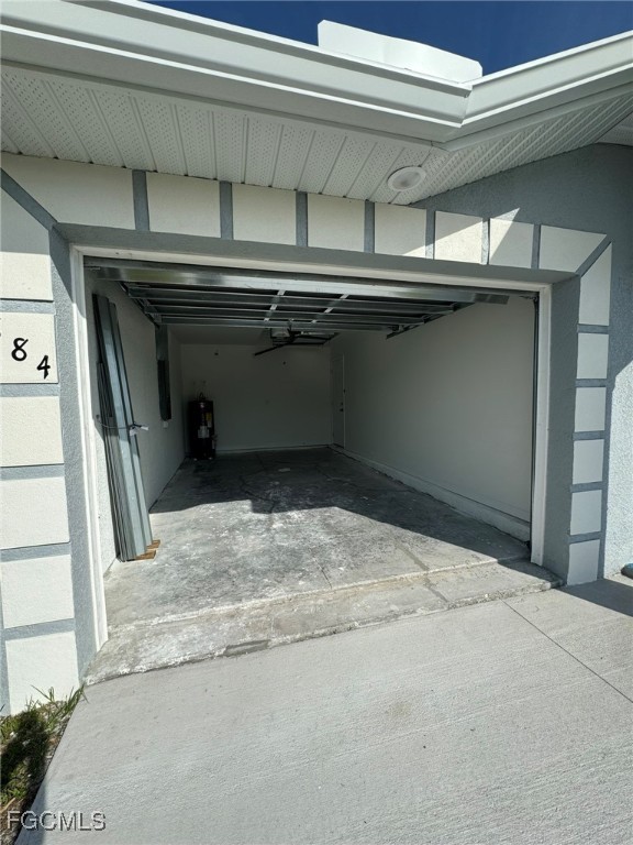 884 Alabama Road South Lehigh Acres, FL 33974 - Photo 33 of 37 a view of a garage