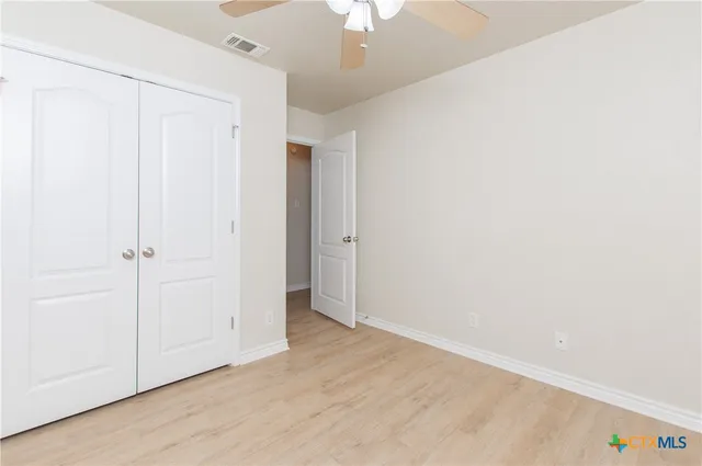 an empty room with a hallway