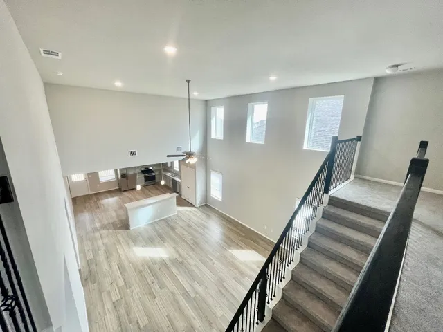 a view of a living room and entryway