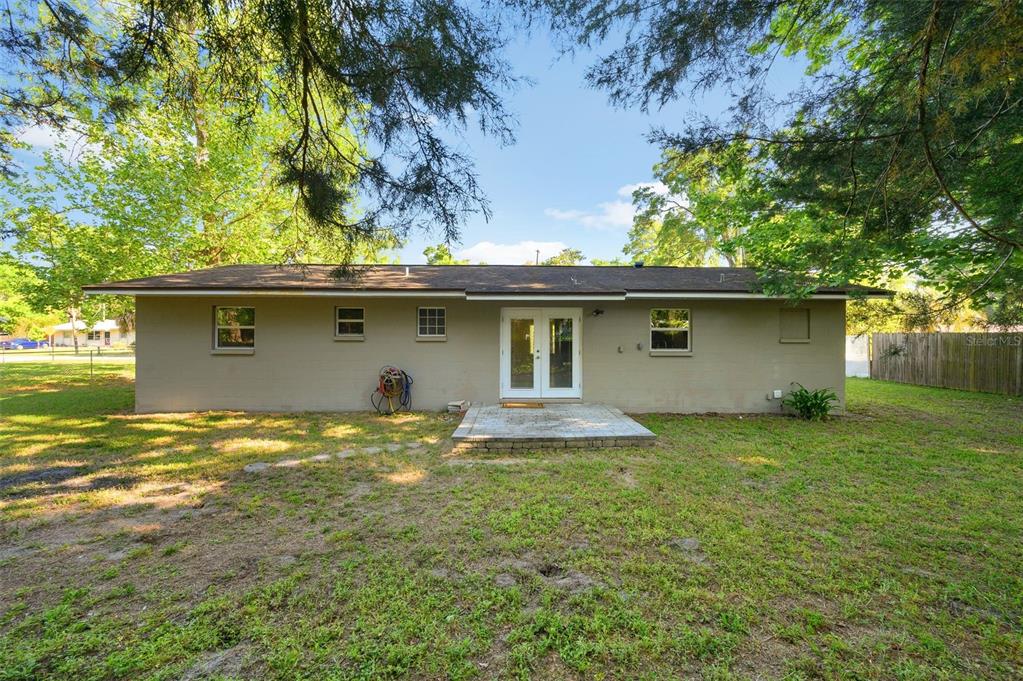 26443 Southwest 3rd Place Newberry, FL 32669 - Photo 25 of 26 a view of a house with a yard