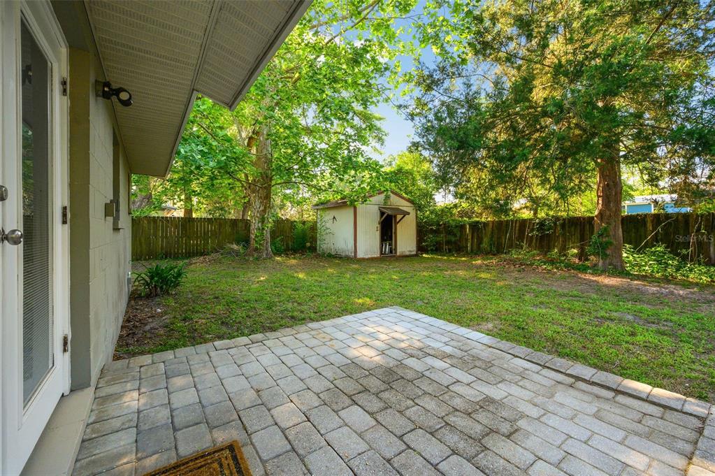 26443 Southwest 3rd Place Newberry, FL 32669 - Photo 26 of 26 a view of a yard with plants and large tree