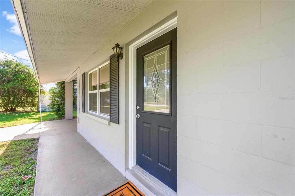 26443 Southwest 3rd Place Newberry, FL 32669 - Photo 3 of 26 a view of a house with backyard and porch