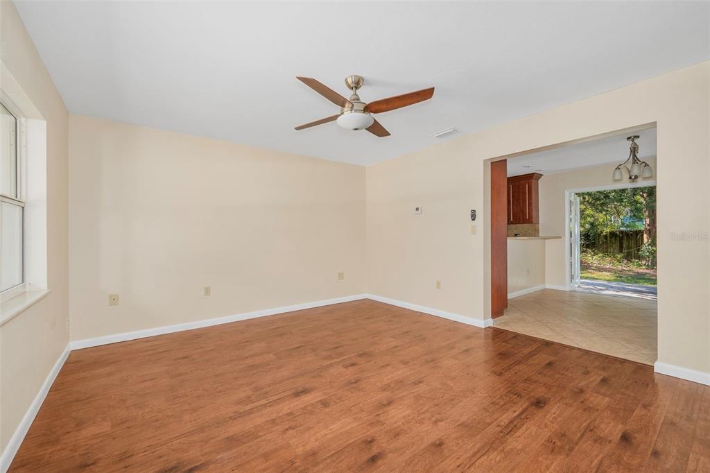 26443 Southwest 3rd Place Newberry, FL 32669 - Photo 4 of 26 an empty room with fan and windows