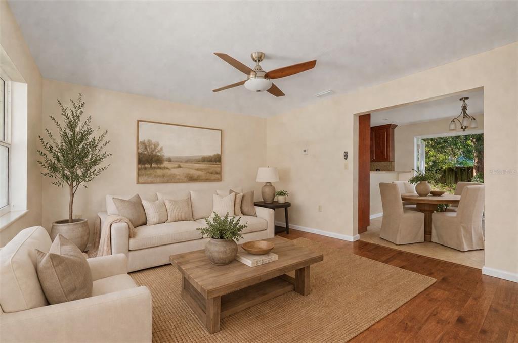 26443 Southwest 3rd Place Newberry, FL 32669 - Photo 5 of 26 a living room with furniture a table and a potted plant