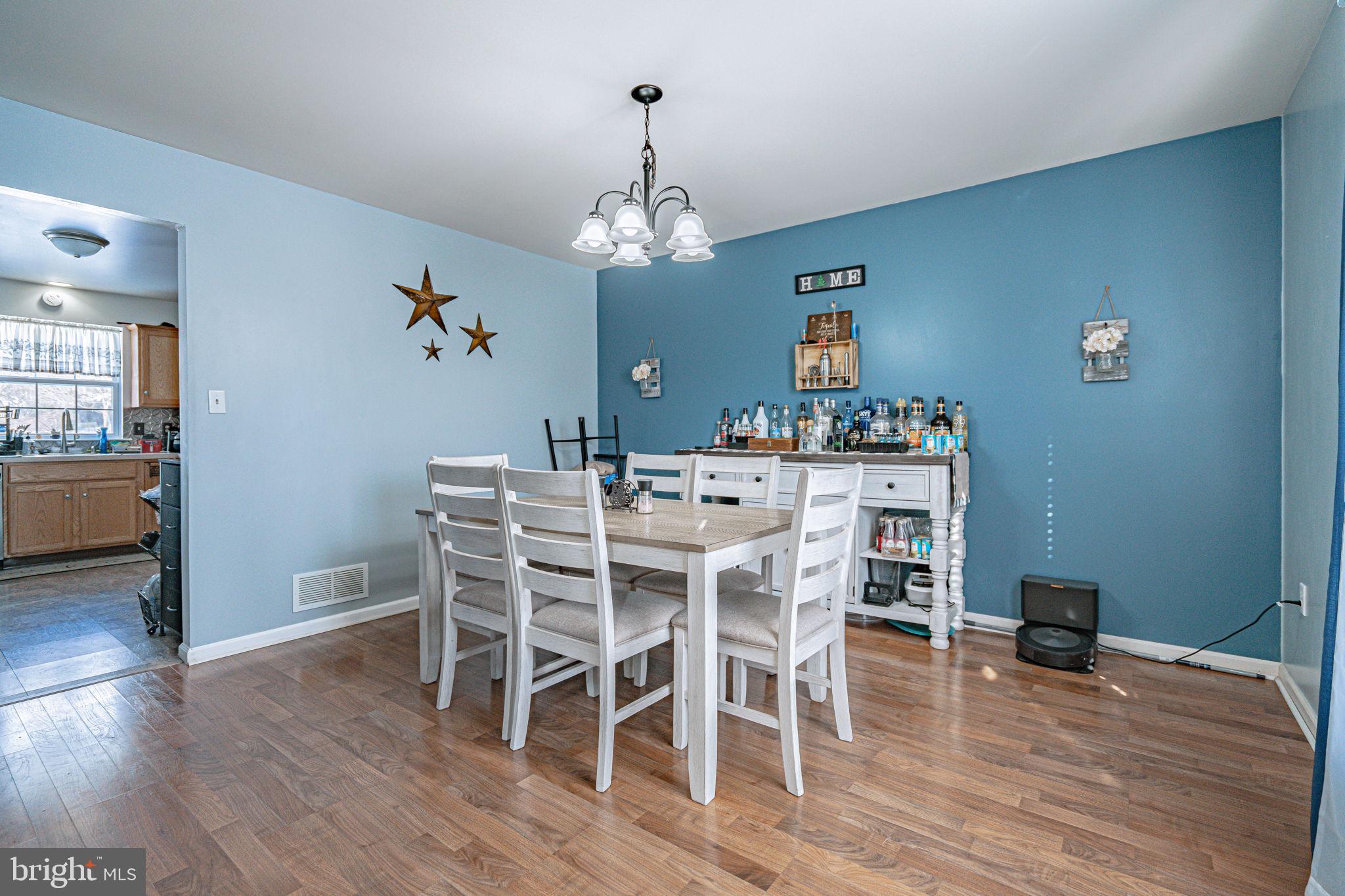 35 Ridgeview Drive Lehighton, PA 18235 - Photo 9 of 58 a view of a dining room with furniture wooden floor and a chandelier