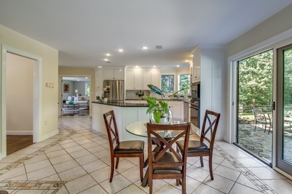 80 B Baldpate Road Boxford, MA 01921 - Photo 8 of 29 a view of a dining room with furniture and a potted plant