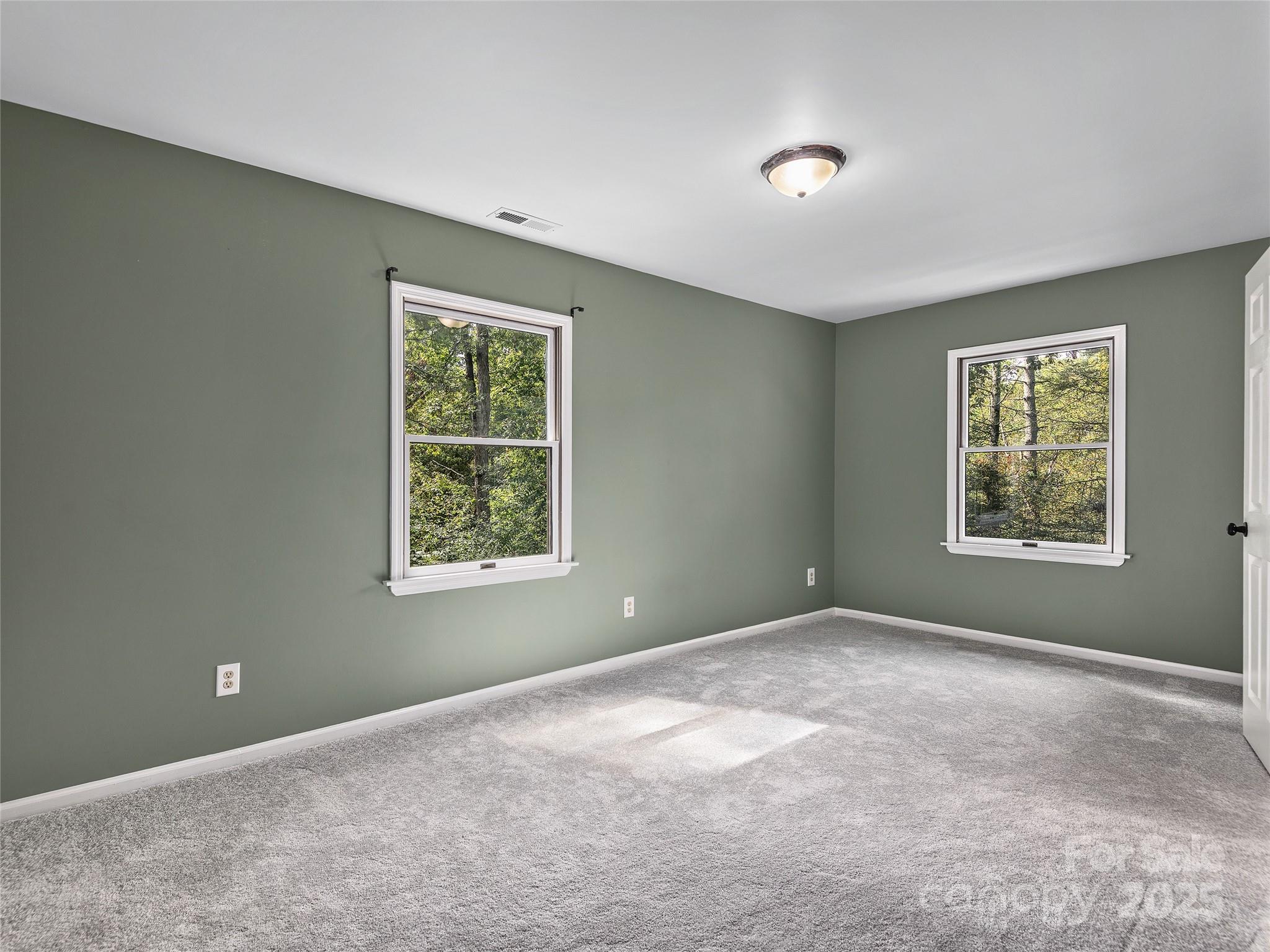 66 High Country Road Weaverville, NC 28787 - Photo 18 of 36 a view of an empty room with a window
