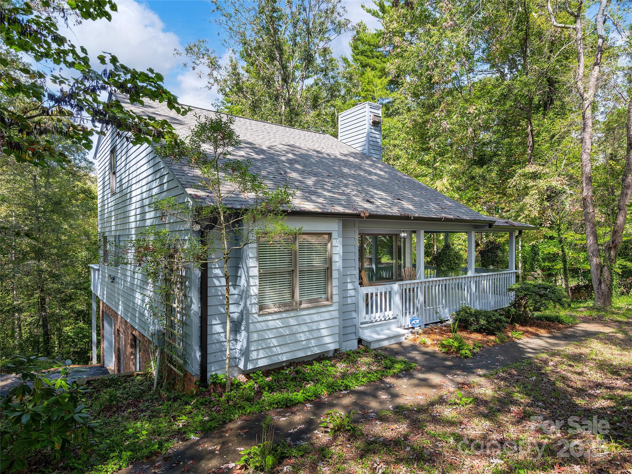 66 High Country Road Weaverville, NC 28787 - Photo 2 of 36 a view of a house with a yard