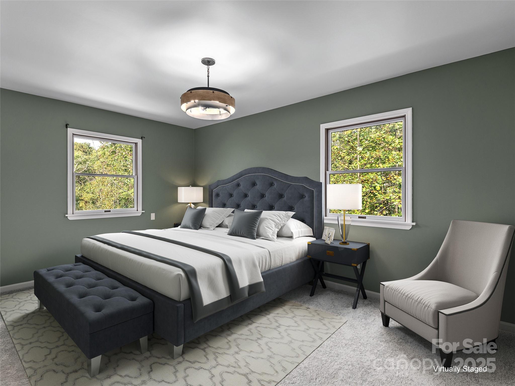 66 High Country Road Weaverville, NC 28787 - Photo 22 of 36 a bedroom with a bed and a chair