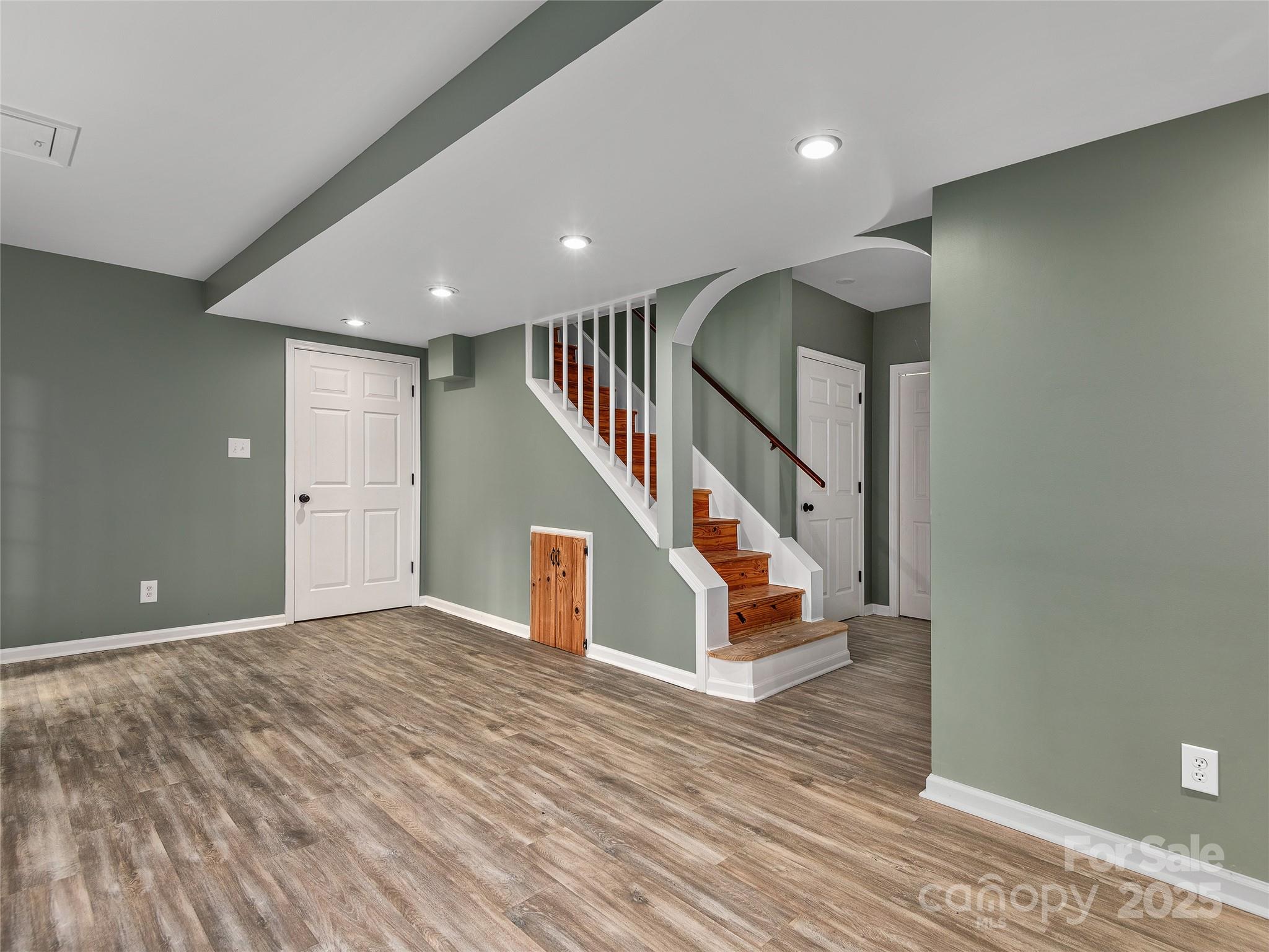 66 High Country Road Weaverville, NC 28787 - Photo 26 of 36 a view of entryway and hall with wooden floor