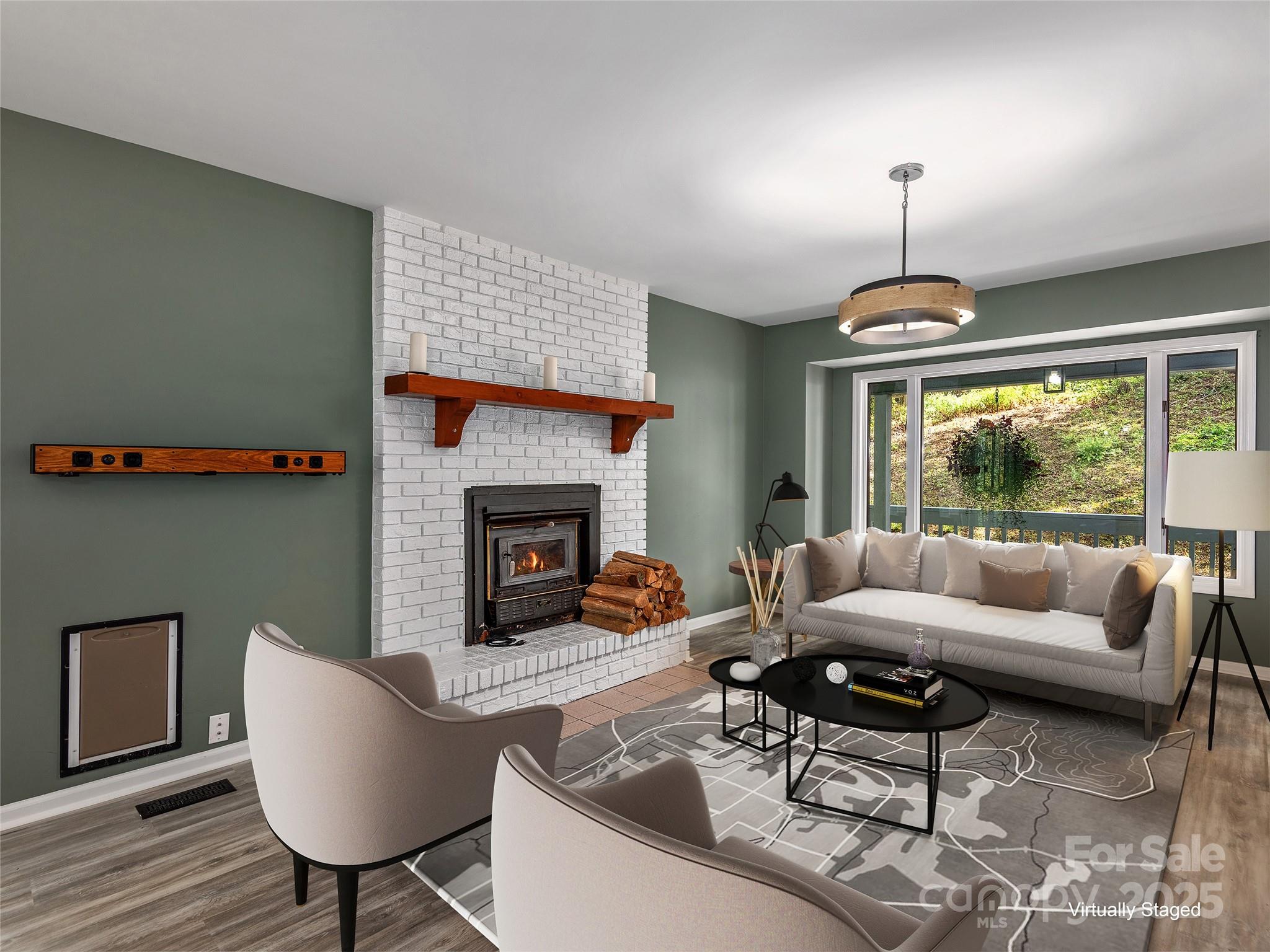 66 High Country Road Weaverville, NC 28787 - Photo 8 of 36 a living room with furniture and a fireplace
