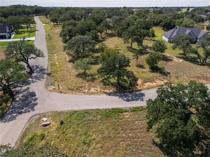 an aerial view of residential house with outdoor space