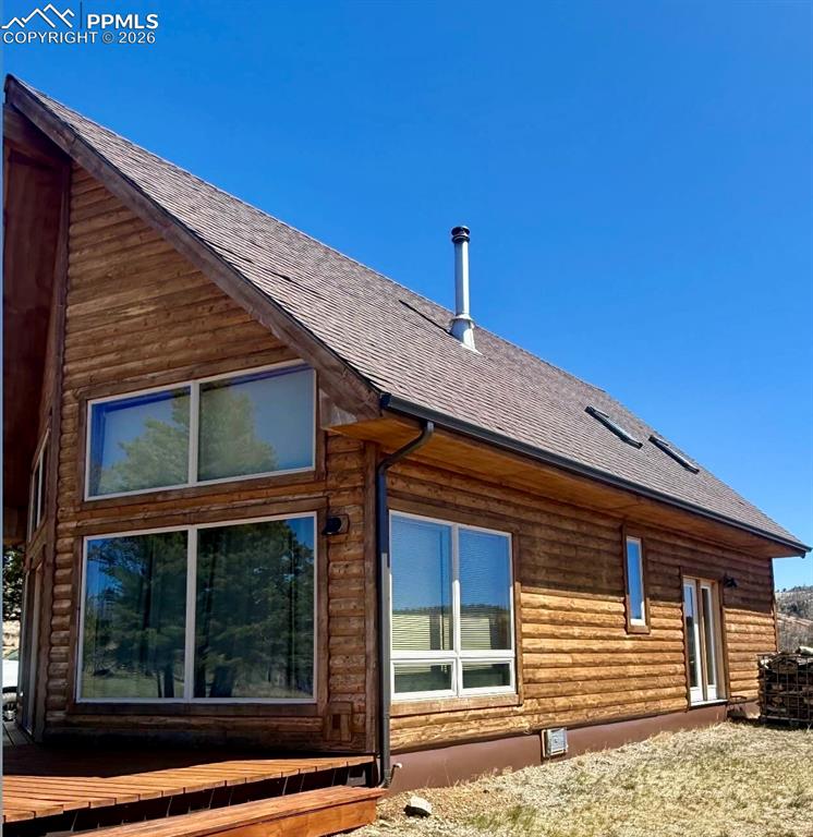 450 Schierl Road Fort Garland, CO 81133 - Photo 5 of 40 a front view of a house with a yard