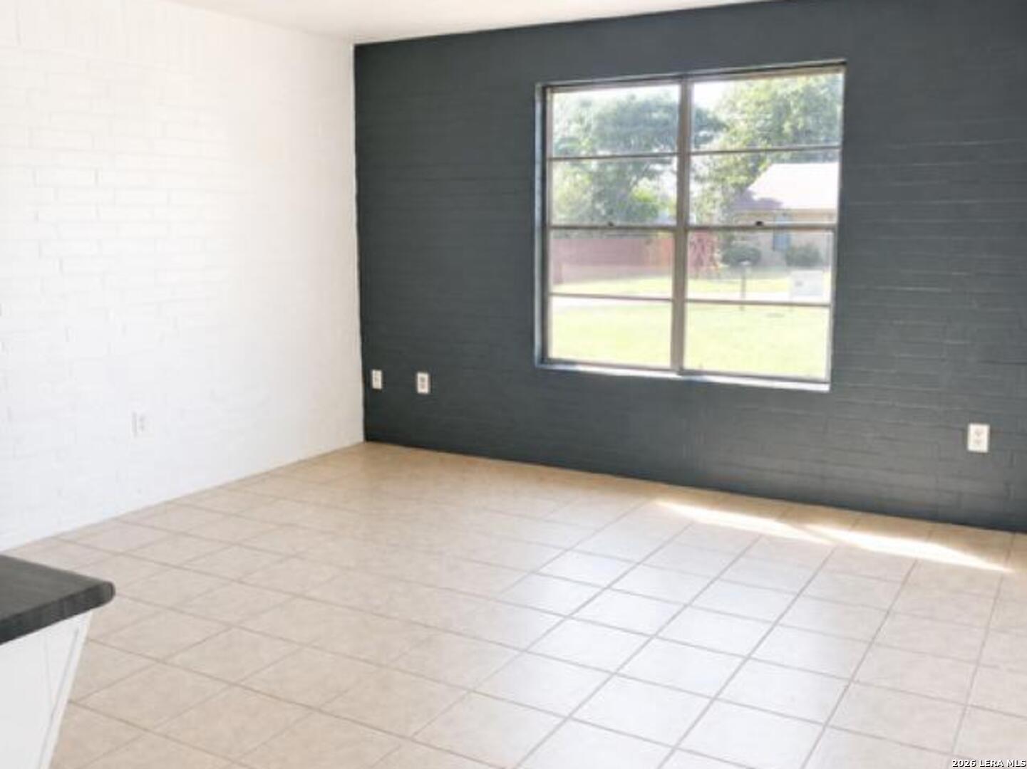 208 Forrest Road, Unit A La Vernia, TX 78121 - Photo 3 of 7 a view of an empty room with a window