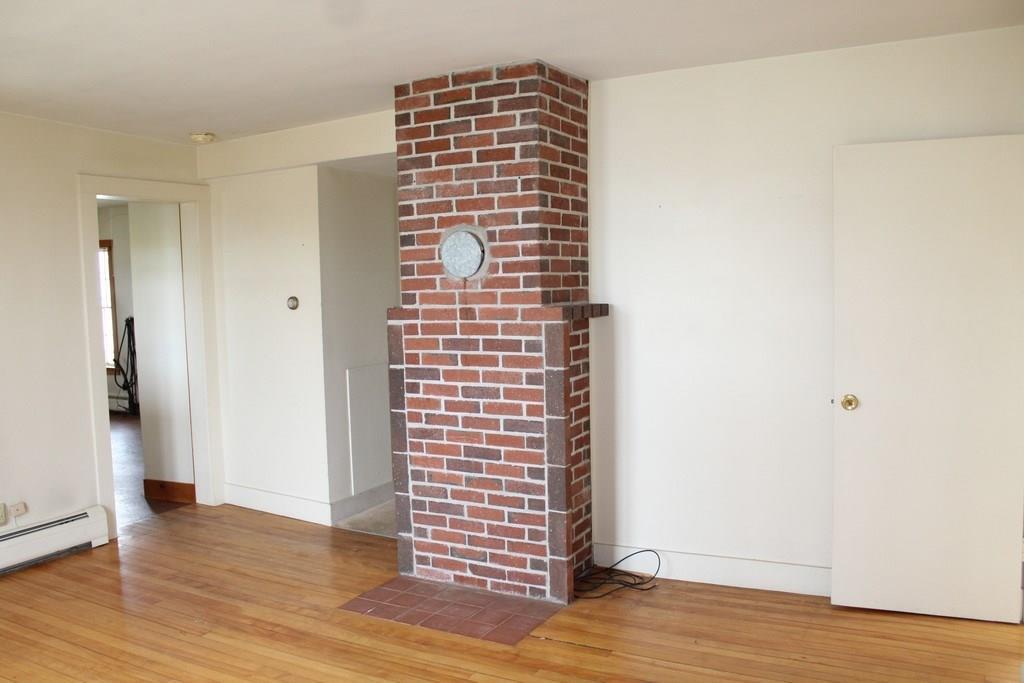 5 Wharf Road Penobscot, ME 04476 - Photo 17 of 35 Living Room, chimney not for use...
